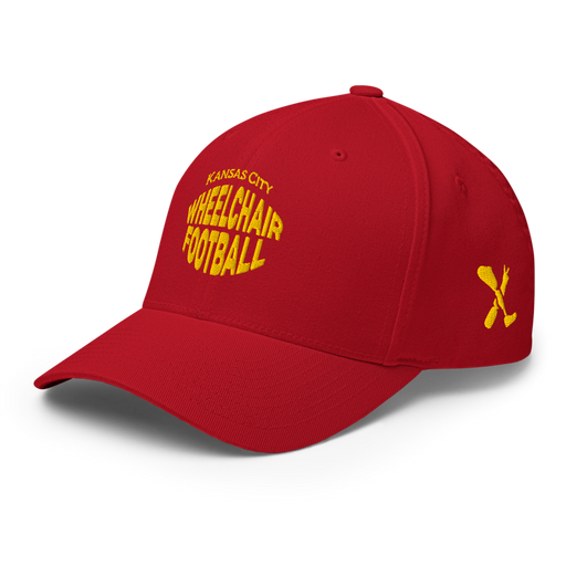 Front left angle of the MAS Kansas City Wheelchair Football Warp Red & Gold Flexfit Curved Bill Fitted against a white background