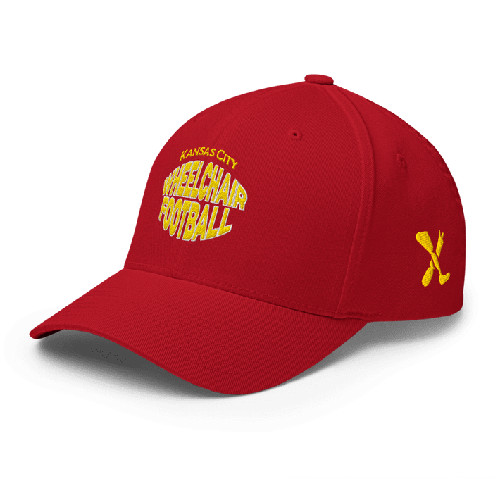 Front left angle of the MAS Kansas City Wheelchair Football Warp Red & Gold Flexfit Curved Bill Fitted against a white background