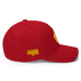 Right side angle of the MAS Kansas City Wheelchair Football Warp Red & Gold Flexfit Curved Bill Fitted against a white background