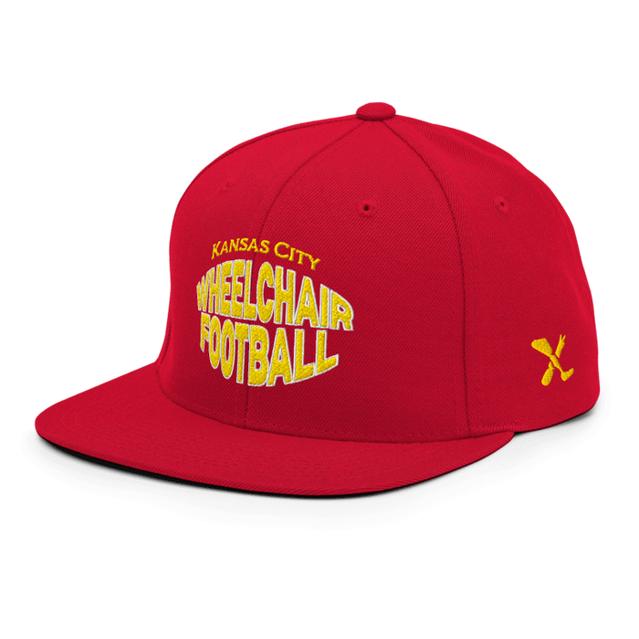 Front left angle of the MAS Kansas City Wheelchair Football Warp Red & Gold Flat Bill Snapback against a white background
