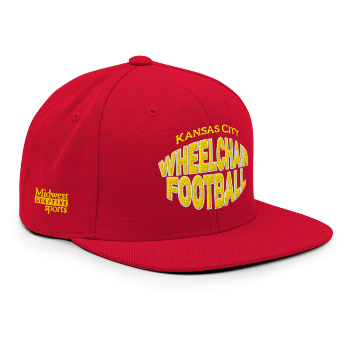 Front right angle of the MAS Kansas City Wheelchair Football Warp Red & Gold Flat Bill Snapback against a white background