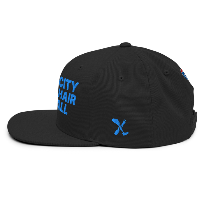 Left angle of the MAS Kansas City Wheelchair Softball Black Flat Bill Snapback against a white background