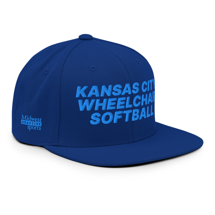 Front right angle of the MAS Kansas City Wheelchair Softball Royal Blue Flat Bill Snapback against a white background