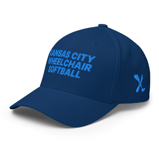 Front left angle of the MAS Kansas City Wheelchair Softball Royal Blue Flexfit Curved Bill Fitted against a white background