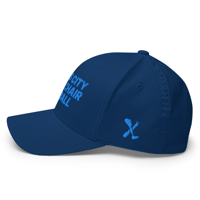 Left angle of the MAS Kansas City Wheelchair Softball Royal Blue Flexfit Curved Bill Fitted against a white background