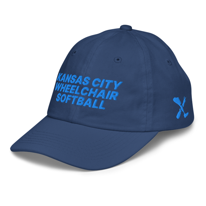 Front left angle of the MAS Kansas City Wheelchair Softball Royal Youth Dad Hat against a white background