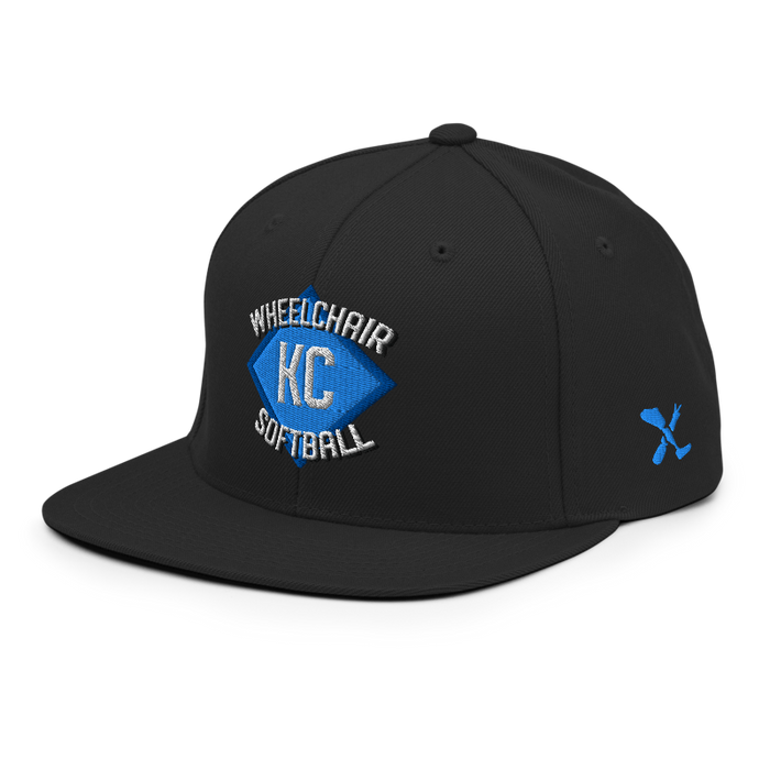 Front left angle of the MAS Kansas City Wheelchair Softball Diamond Black Flat Bill Snapback against a white background