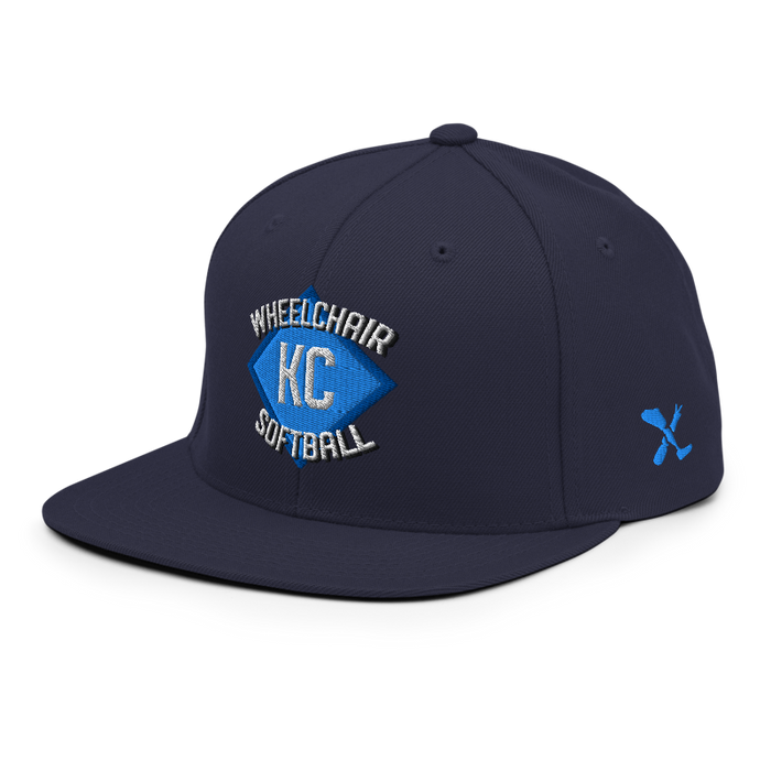 Front left angle of the MAS Kansas City Wheelchair Softball Diamond Navy Flat Bill Snapback against a white background