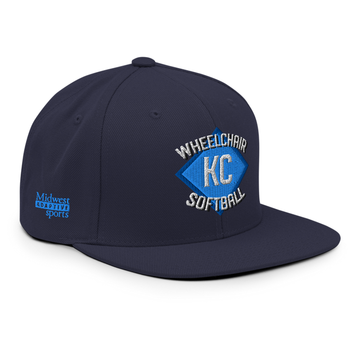 Front right angle of the MAS Kansas City Wheelchair Softball Diamond Navy Flat Bill Snapback against a white background