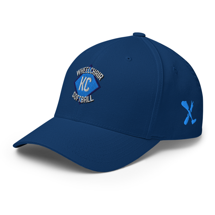 Front left angle of the MAS Kansas City Wheelchair Softball Diamond Royal Blue Flexfit Curved Bill Fitted against a white background