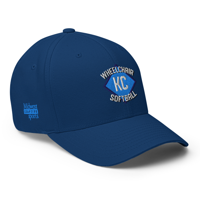 Front right angle of the MAS Kansas City Wheelchair Softball Diamond Royal Blue Flexfit Curved Bill Fitted against a white background