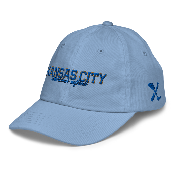 Front left angle of the MAS Kansas City Wheelchair Softball Script Baby Blue Youth Dad Hat against a white background