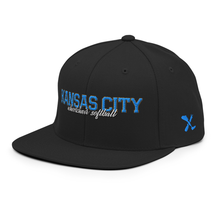Front left angle of the MAS Kansas City Wheelchair Softball Script Black Flat Bill Snapback against a white background