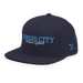 Front left angle of the MAS Kansas City Wheelchair Softball Script Navy Flat Bill Snapback against a white background