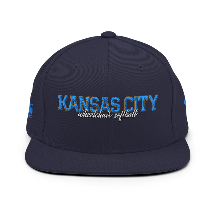 Front angle of the MAS Kansas City Wheelchair Softball Script Navy Flat Bill Snapback against a white background