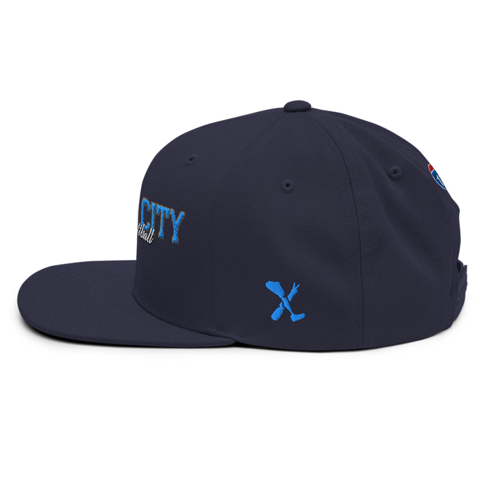 Left angle of the MAS Kansas City Wheelchair Softball Script Navy Flat Bill Snapback against a white background