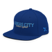 Front left angle of the MAS Kansas City Wheelchair Softball Script Royal Blue Flat Bill Snapback against a white background