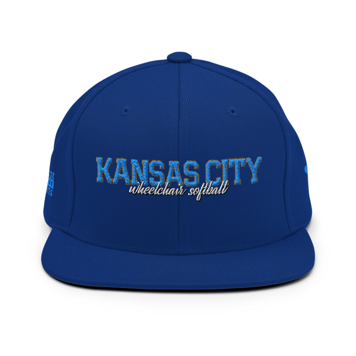Front angle of the MAS Kansas City Wheelchair Softball Script Royal Blue Flat Bill Snapback against a white background