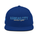 Front angle of the MAS Kansas City Wheelchair Softball Script Royal Blue Flat Bill Snapback against a white background