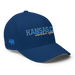 Front right angle of the MAS Kansas City Wheelchair Softball Script Royal Blue Flexfit Curved Bill Fitted against a white background