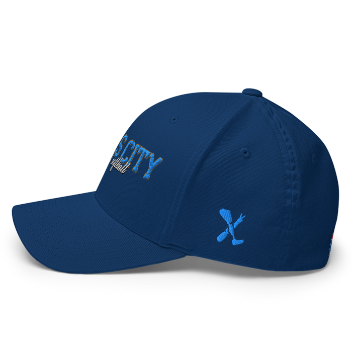 Left angle of the MAS Kansas City Wheelchair Softball Script Royal Blue Flexfit Curved Bill Fitted against a white background