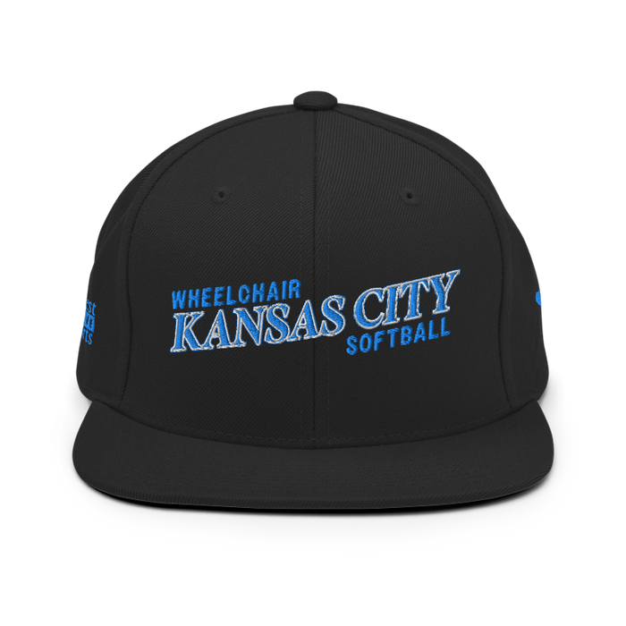 Front angle of the MAS Kansas City Wheelchair Softball Slant Black Flat Bill Snapback against a white background