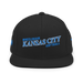 Front angle of the MAS Kansas City Wheelchair Softball Slant Black Flat Bill Snapback against a white background