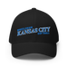Front angle of the MAS Kansas City Wheelchair Softball Slant Black Flexfit Curved Bill Fitted against a white background