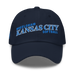 Front angle of the MAS Kansas City Wheelchair Softball Slant Navy Dad Hat against a white background