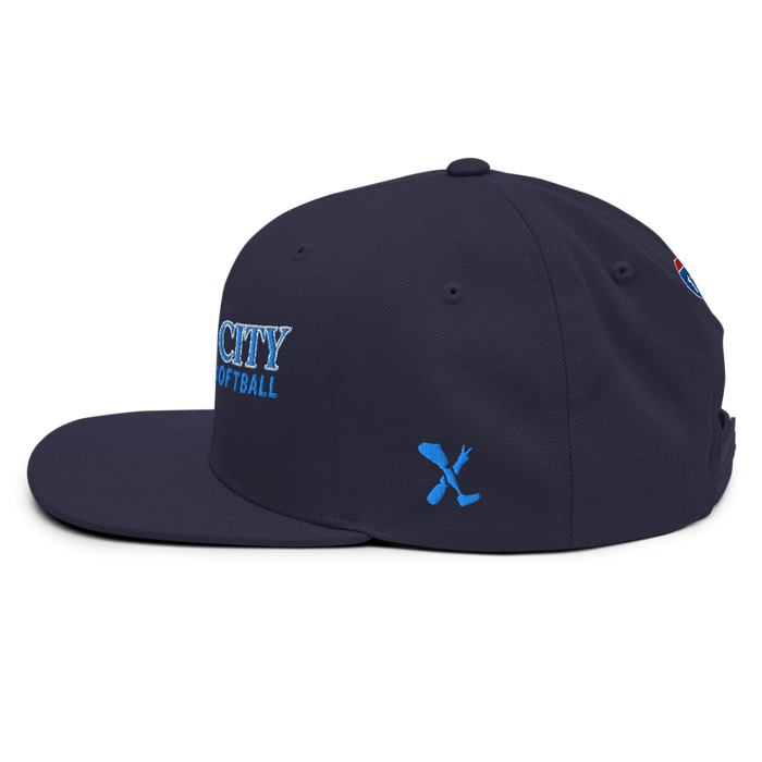Left angle of the MAS Kansas City Wheelchair Softball Slant Navy Flat Bill Snapback against a white background