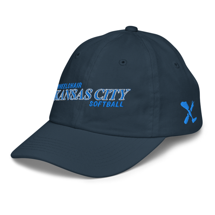 Front left angle of the MAS Kansas City Wheelchair Softball Slant Navy Youth Dad Hat against a white background