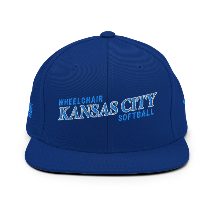 Front angle of the MAS Kansas City Wheelchair Softball Slant Royal Blue Flat Bill Snapback against a white background