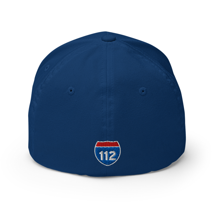 Back angle of the MAS Kansas City Wheelchair Softball Slant Royal Blue Flexfit Curved Bill Fitted against a white background