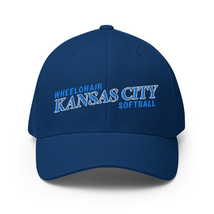 Front angle of the MAS Kansas City Wheelchair Softball Slant Royal Blue Flexfit Curved Bill Fitted against a white background