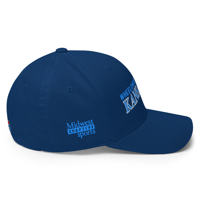Right angle of the MAS Kansas City Wheelchair Softball Slant Royal Blue Flexfit Curved Bill Fitted against a white background