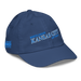 Front right angle of the MAS Kansas City Wheelchair Softball Slant Royal Youth Dad Hat against a white background