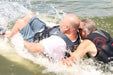 MAS Day at the Lake adaptive water ski participant being assisted by a volunteer at the beginning of their ride  on Smithville Lake