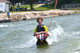 MAS Day at the Lake participant enjoying water skiing while being pulled from a boat at Smithville Lake