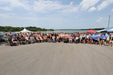 MAS Day at the Lake volunteers and participants on the water at the annual adaptive watersports clinic