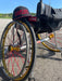 MAS Kansas City Chiefs defender and Team Amplife® Ambassador Jason Loftiss' football wheelchair with the Amplife® Flat Bill Snapback on his wheelchair and Amplife® logo sticker on the side of his wheelchair