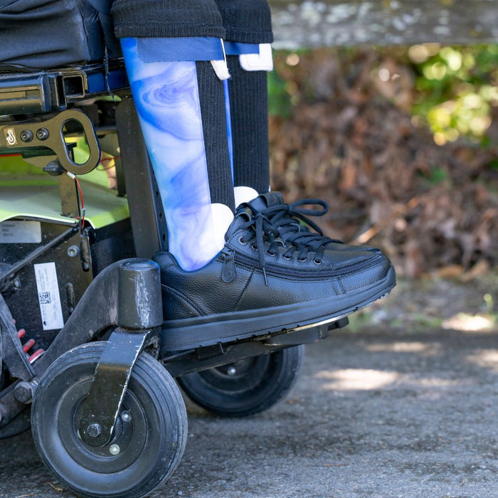 Men's Black to the Floor Leather BILLY Comfort Plush being modeled outdoors on a power wheelchair.