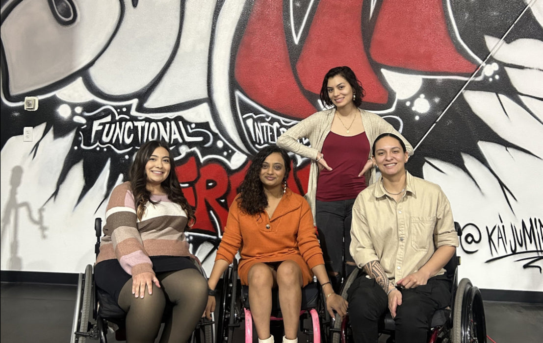 Four NorCal SCI members at a support group meet up in a gym.