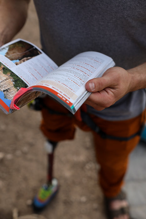Person holding an open book.