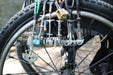 Close-up of a climbing equipment on a wheelchair rim.
