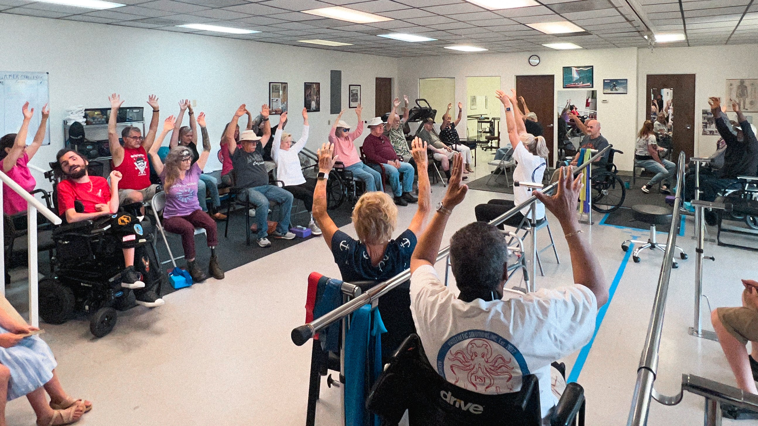 Group of Prosthetic Solutions patients enjoying yoga class through Fitness for Life