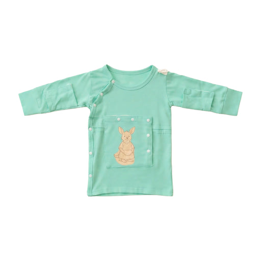 Front angle of the PediaTech Apparel LineWear Central Line Access Baby Gown in mint green (Calm Mint Edition), laid flat with the kangaroo chest pocket snapped closed against a white background
