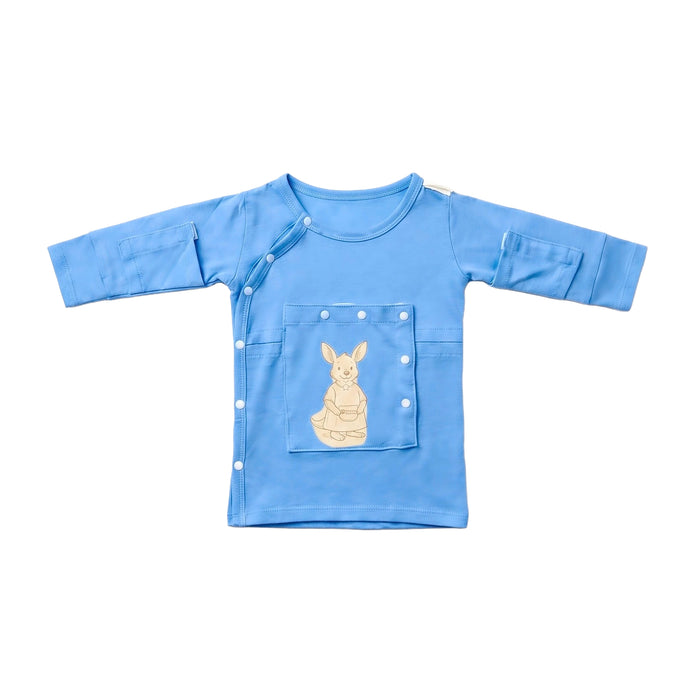 Front angle of the PediaTech Apparel LineWear Central Line Access Baby Gown in light blue (Sky Lullaby Edition), laid flat with the kangaroo chest pocket snapped closed against a white background