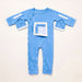 Front angle of the PediaTech Apparel LineWear Central Line Access Baby & Toddler Bodysuit in light blue (Sky Lullaby Edition) with the chest pocket flap opened to show its white lining and both sleeve openings unsnapped, laid flat against an off-white background