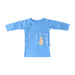 Front angle of the PediaTech Apparel TubeWear G/J Tube Access Baby Gown in light blue (Sky Lullaby Edition), laid flat with the kangaroo pocket over the abdomen snapped closed against a white background