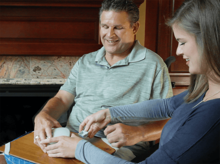 Two people with disabilities using ClipDifferent adaptive nail clipper